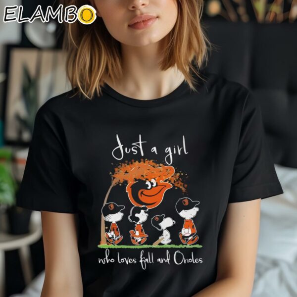 The Peanuts Snoopy And Friends Just A Girl Who Loves Fall And Baltimore Orioles Shirt